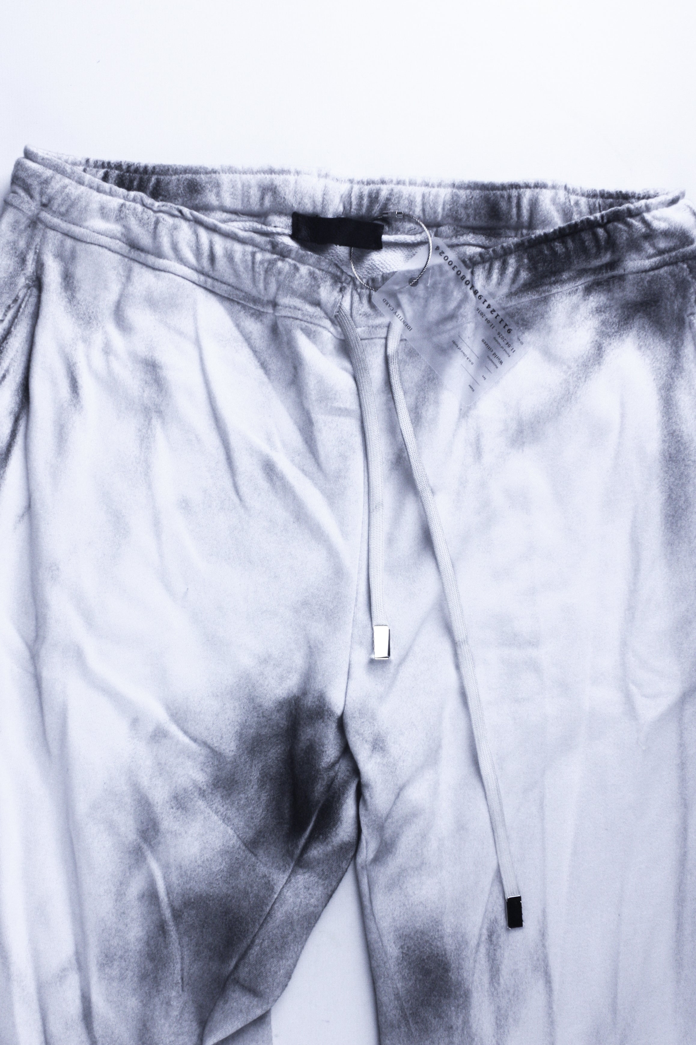 DIRTY WHITE TWISTED SWEATPANTS