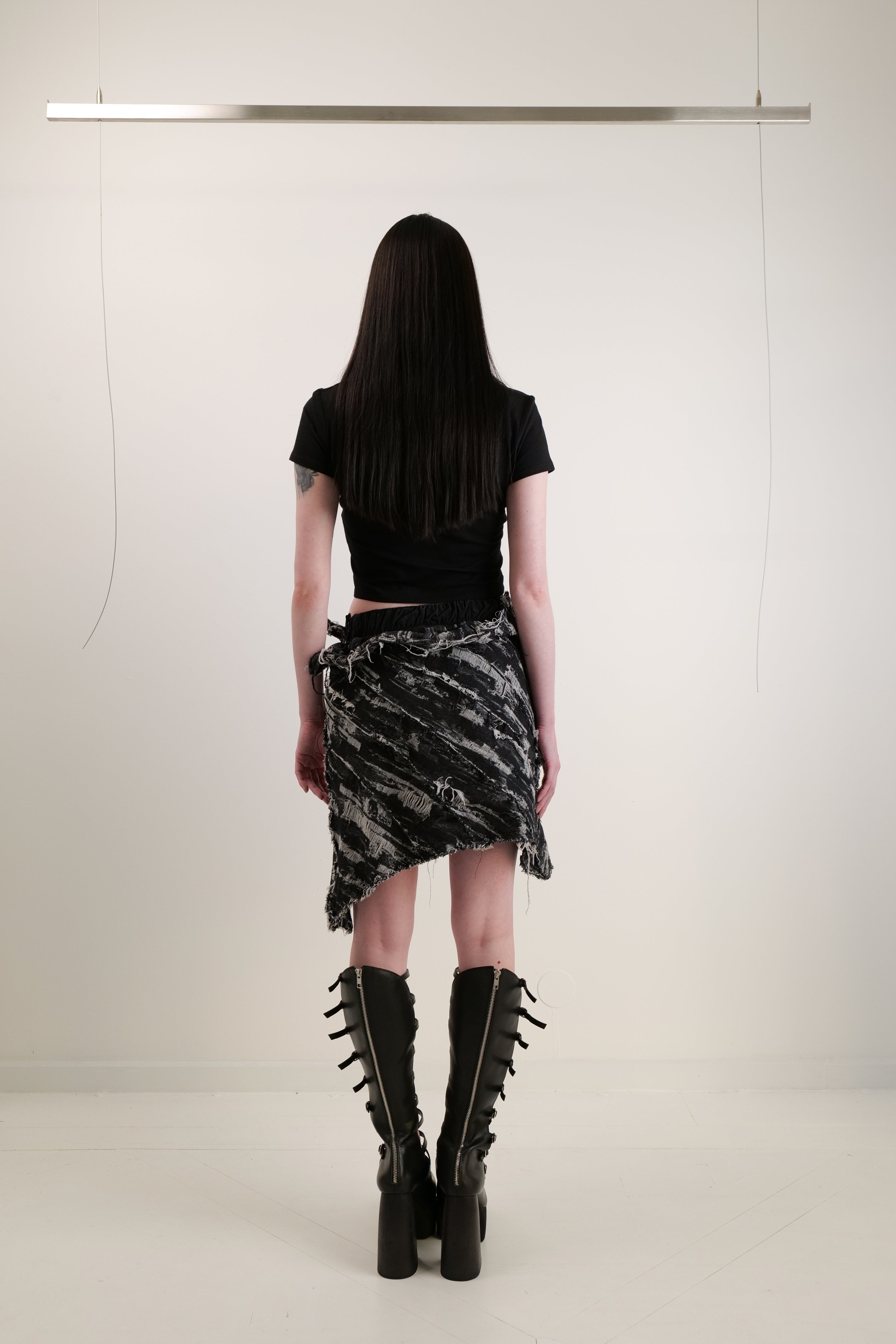 Distressed denim skirt